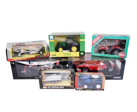 Boxed diecast vehicles to include: a Minichamps Vodafone McLaren Mercedes; Hot Wheels F1 2000; a Bburago Williams FW14; toget