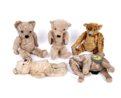 Five mid-20th Century teddy bears, including a Merrythought elephant with a crescent moon back cover, and four others. (5)