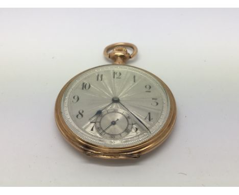 A 14 ct button wind pocket watch the silvered dial with second subsidiary dial and Arabic numerals