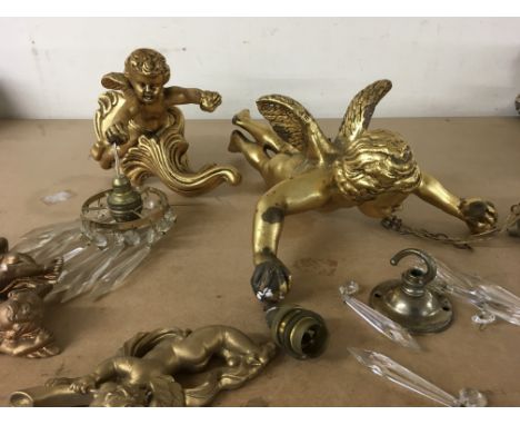 Two cherub light fittings with glass drops