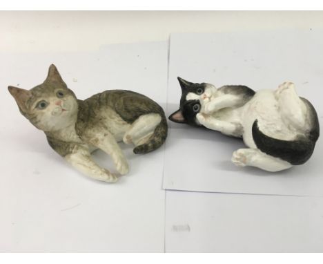 Two Royal Worcester cats, "Black &amp; White" and "Tabby"