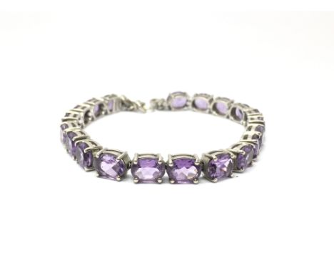 An amethyst set silver bracelet, total weight approx 16.3 grams.