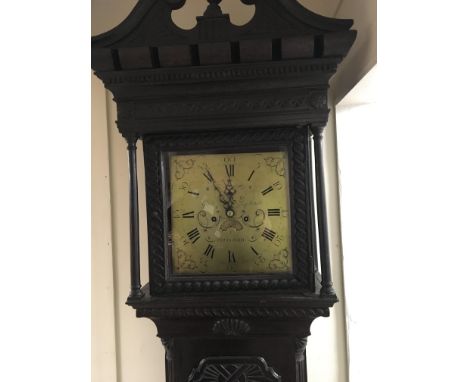 A Quality and rare late 18th Century Carved Oak longcase clock with a brass dial and eight day going Maker Geo Searle Chudlei