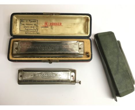 Two Hohner harmonicas comprising a 64 Chromonica and a Super Chromonica