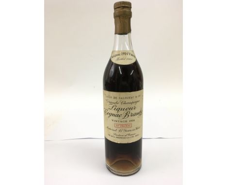 A bottle of vintage 1961 Louis de Salignac Grande Champagne Liqueur Cognac Brandy vintage 1914