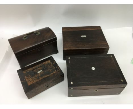 Two wooden stationary boxes with pearl iinlay, a tea caddy and one other box