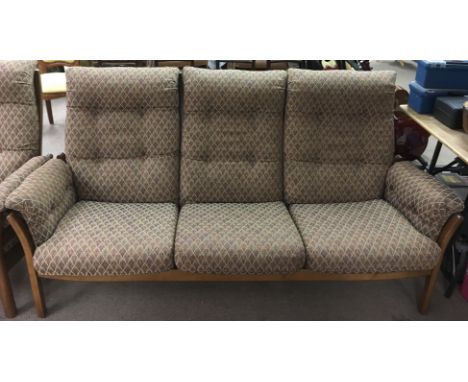 Two Ercol sofas, a three seater and a two seater, with mid brown frame and contemporary patterned upholstery. Approx 170x94x5