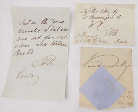 The signatures of Queen Victoria and Queen Adelaide1. Clipped card with Victoria R signature and pasted blue paper clipping w