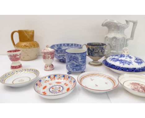A selection of mostly 19th century ceramics to include:a stoneware harvest-style jug (20 cm high); a mid-19th century salt-gl