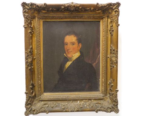 Circle of Sir William Beechey (1753-1839) - Half-length portrait of a gentleman in black coat and white collar and stock; oil