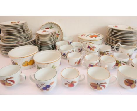 A quantity of Royal Worcester Evesham tableware to include:&nbsp;dinner and side plates, flan dish,&nbsp;soufflé bowls, lidde