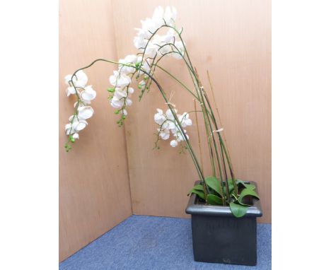 A modern square ceramic planter with grey mottled glaze, together with artificial orchid (38cm square x 33.5cm high)&nbsp;