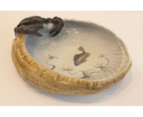 A circa 1970 Royal Copenhagen bowl: designed by Jorgen Balsloc and finely modelled as a basket with a crab on the rim looking