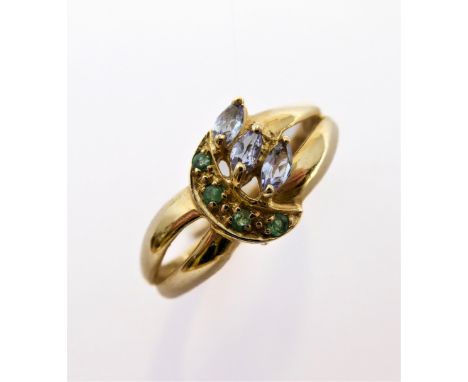 A 10-carat gold tanzanite and emerald ring,&nbsp;size N/O