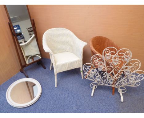 A mixed lot of five:a Lloyd Loom bergère and another similar wicker chair;an early 20th century painted oval mirror;a cheval 