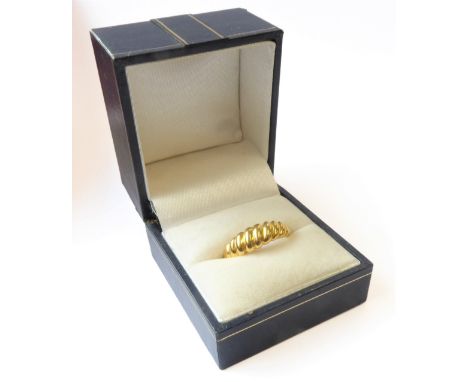 A silver-gilt dress ring modelled as concentric gadrooning, ring size M (boxed)