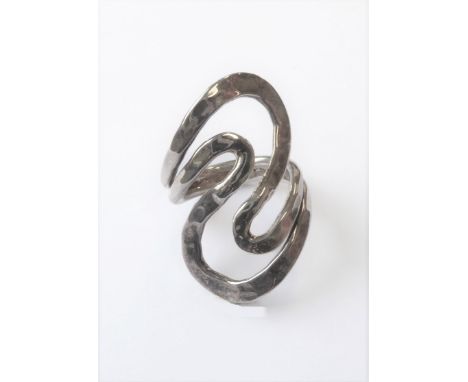 A hand planished silver ring of swirling design, ring size M (boxed)