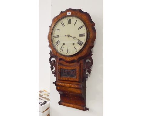 A 19th century drop-dial walnut and marquetry eight-day wall-hanging clock: cream enamel dial with Roman numerals; the lower 