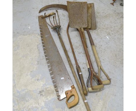 A selection of Vintage garden tools, comprising 3 shovels, a large saw, a scythe and hoe 