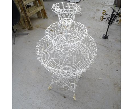 A white painted circular 4-tier wirework garden planter, D65cm, H115cm 