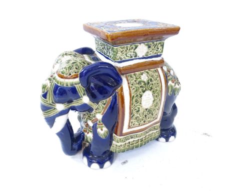 A glazed ceramic elephant garden seat, L50cm, H44cm 