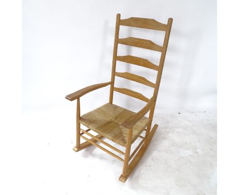 A Cotswold School style ladder-back rocking chair 