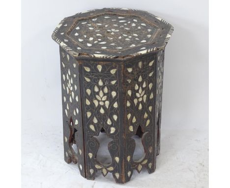 An Anglo-Indian octagonal occasional table, with inlaid bone and mother-of-pearl decoration, W36cm, H47cm 