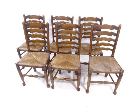 A set of 6 oak North Country style ladder-back rush-seated dining chairs 
