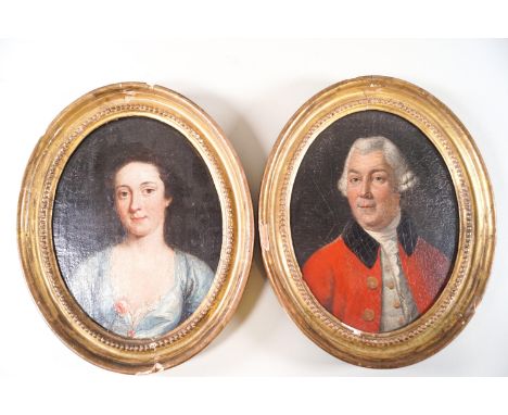 A late 18th century portrait of Mrs Young in a blue dress, oil on canvas on panel in an oval gilt frame, 18 x 14 cms, with an