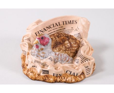 A Royal Doulton figure 'A Partridge' in an FT', designed by Graham Tongue and numbered 909 of 1200, 6cm high