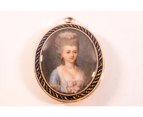 An 18th century portrait of a lady in a blue dress, watercolour on ivory, in a yellow and enamel frame with hair back, inscri