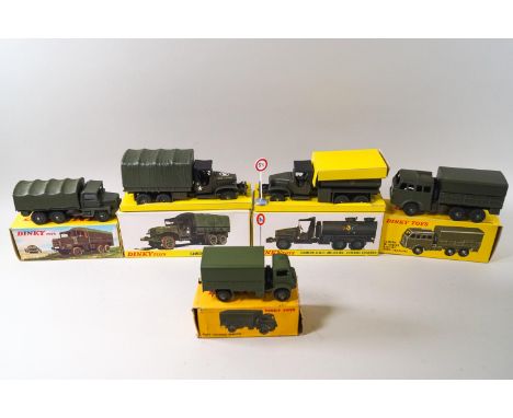 A Dinky army covered wagon No 623, a Camion GMC Militaire Bache No 809, a Camion Militaire Berlet Tous Terrains No 818, a Cam
