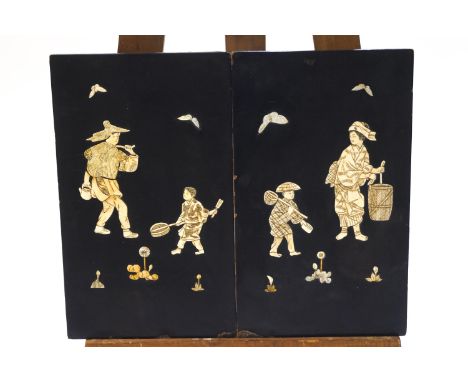 A pair of early 20th century Japanese lacquered panels with bone figures in relief, 45.5cm x 27cm