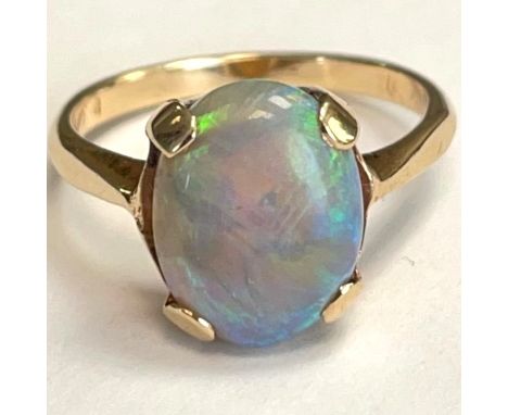 Single oval opal ring set in a10k marked setting. Size N. Approximately 3.3 grams