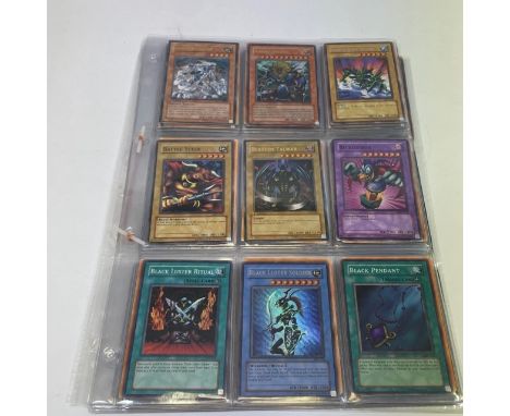 A collection of Yu Gi Oh trading card game cards 1996.&nbsp; Including Blue-Eyes White Dragon 1st Edition.&nbsp; Summoned Sku