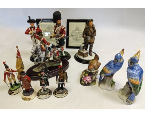 A collection of ceramic figures to include military and bird figurines.

Birds include, a pair of Sitzendorf parrots and a Ro