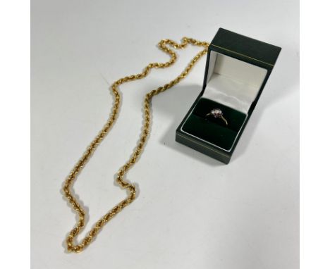 750 18ct Gold rope chain necklace (circa 16.5grams) And a 750 18ct Yellow Gold diamond &amp; ruby ring (circa 2.5grams).