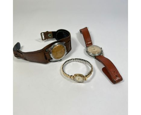 A 9ct Tissot Manual wind watch on plated strap &amp; two gents wristwatches only one working.
