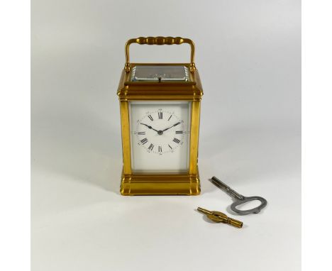 A Henri Jacot Carriage Clock as follows:

- engraved to the rear of the case with HJ and with the associated trademark of a p