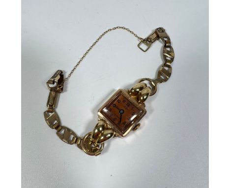 A ladies 9ct BWC cared ladies manual wind wristwatch on a gold plated strap, total weight approx 16grams not currently runnin