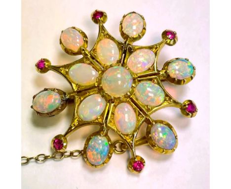 Opal and ruby clustered brooch / pendant: 13 opals with 6 small rubies around outside. Unhallmarked gold, tests to approximat