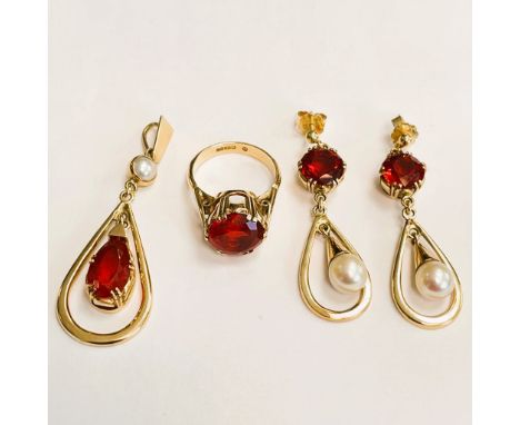 Mexican fire opal earrings, pendant and ring: Ring is 18 carat gold (1991) with 11.25 mm Mexican fire opal 4.9 carat weight, 