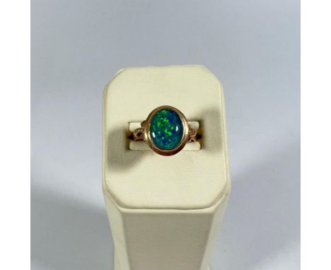 18ct Opal and Yellow Gold Ring m- size 'N' circa 4.7grams.