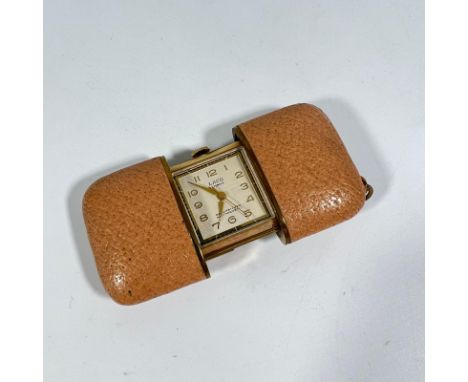 Laco 17 jewel travel clock.