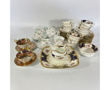 Part coalport cobalt blue batwing tea-set comprising of 11 cups, 12 saucers, 12 tea plates, milk jug, sugar bowl &amp; sandwi