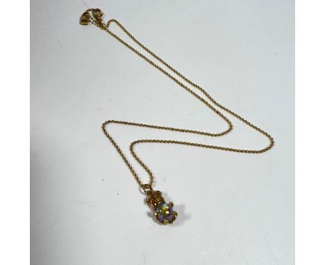 An 18ct yellow gold diamond pendant on a 9ct yellow gold (approx) 40cm chain and a gilt teddy bear charm, total approx 4grams