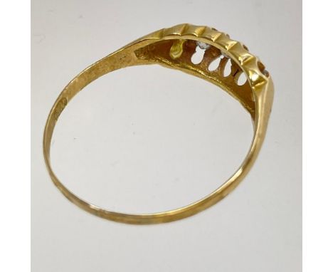 18ct five diamond graduated half hoop ring. Unhallmarked gold, tests to approximately 18ct. Inclusions in diamonds. Size U. A