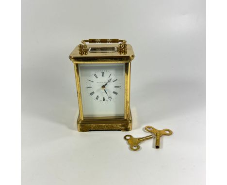 Matthew Norman Carriage Clock as follows:

- Roman numerals
- inscribed on the face' 'Matthew Norman', London, Swiss Made&nbs