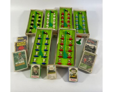 A collection of Subbuteo football teams and equipment, Top Trumps and other cards.