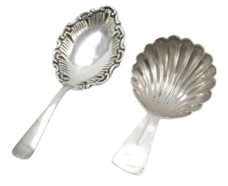 Two silver caddy spoons, comprising one George IV shell moulded spoon, Birmingham 1922, and Edward VII spoon with rococo styl